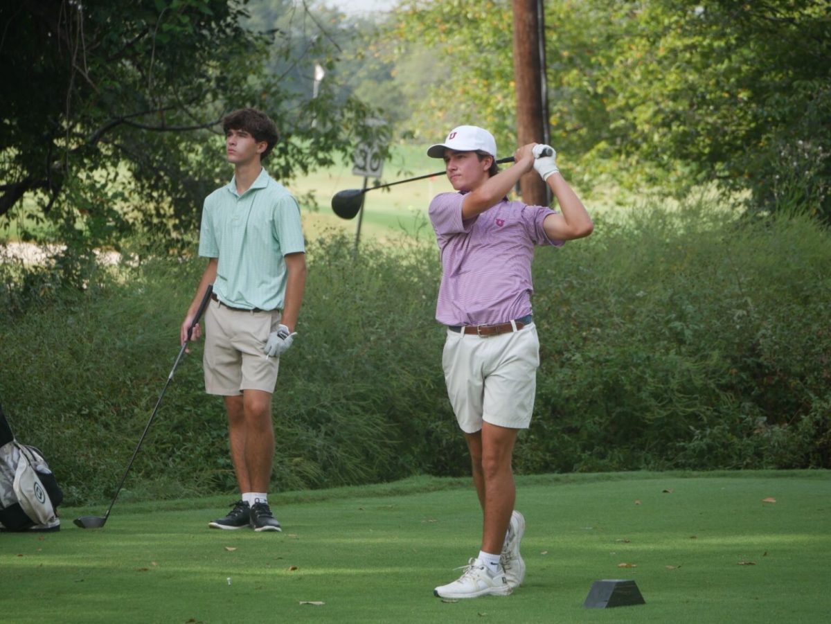 Brantley Moore (11) swings in the state tournament.