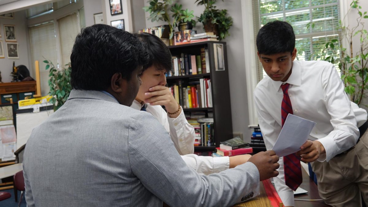 MUS delegates contemplate their mock crises.