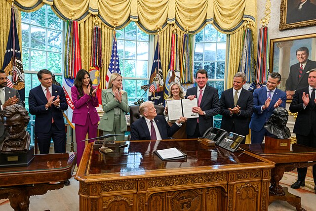 President Donald Trump signs the executive order that deployed the National Guard to Memphis, Tenn. on Monday, Sept. 15, 2025.