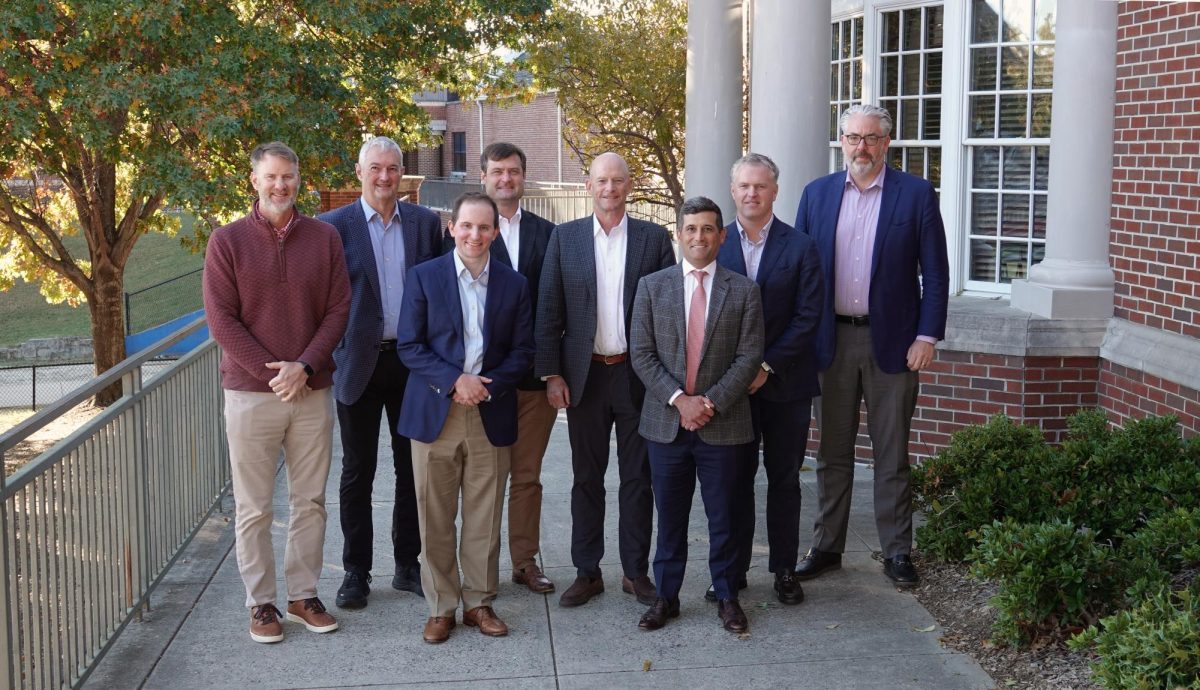 Founding members of the National Alumni Advisory Council pose for a photograph on the Alumni Terrace.