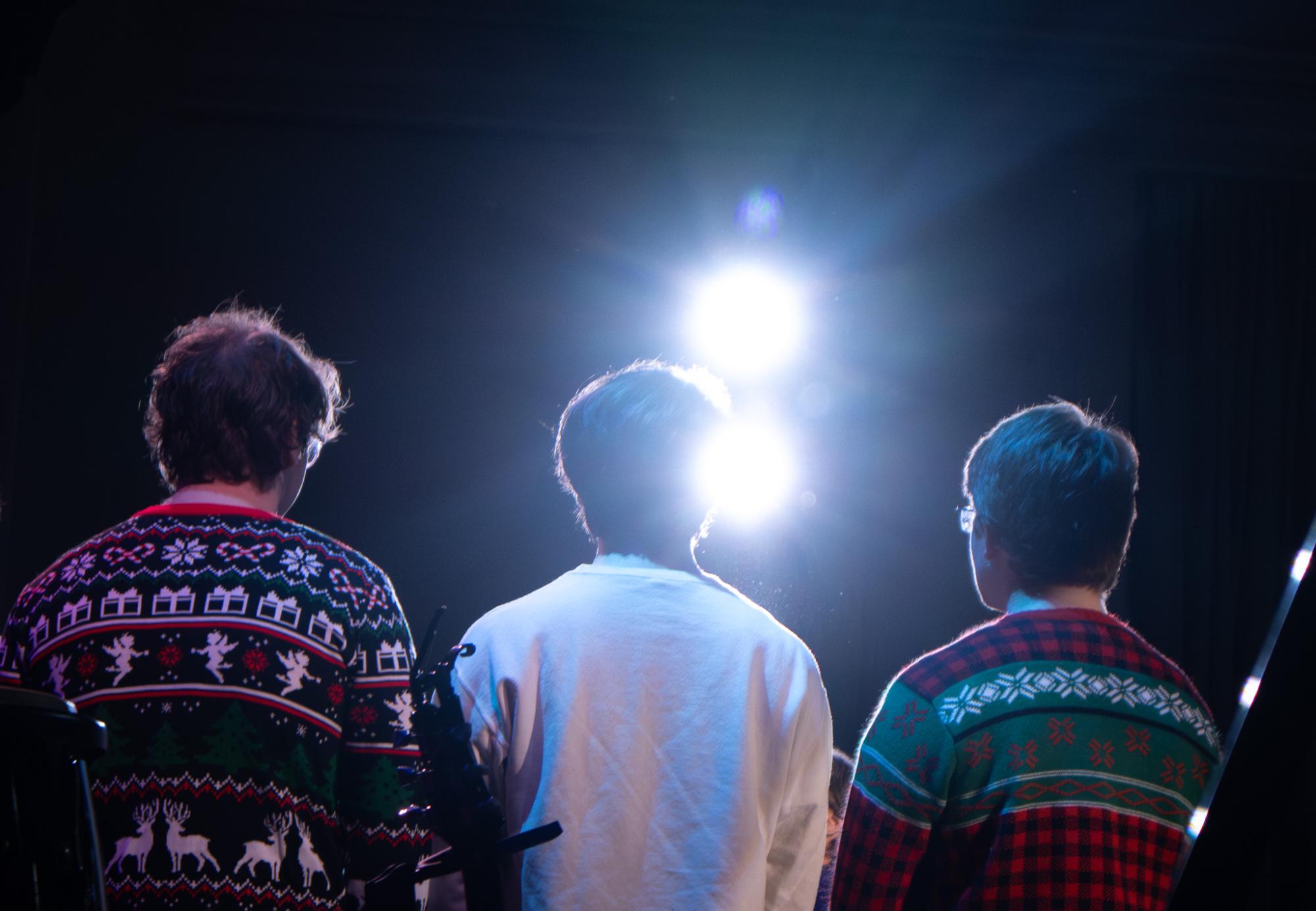 Members of Beg To Differ sing on stage during their chapel performance, Dec. 12.