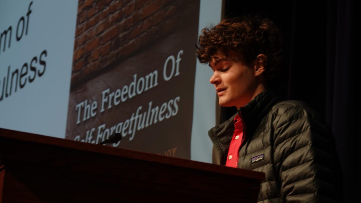 Chase Frazer (11) speaks to the Upper School about "The Freedom of Self-Forgetfulness." Photo Courtesy of MUS Communications.