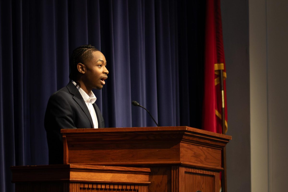 Jeremy Burks (12) presents his experience as a Black student at MUS in his chapel talk on Wednesday, Feb. 11.