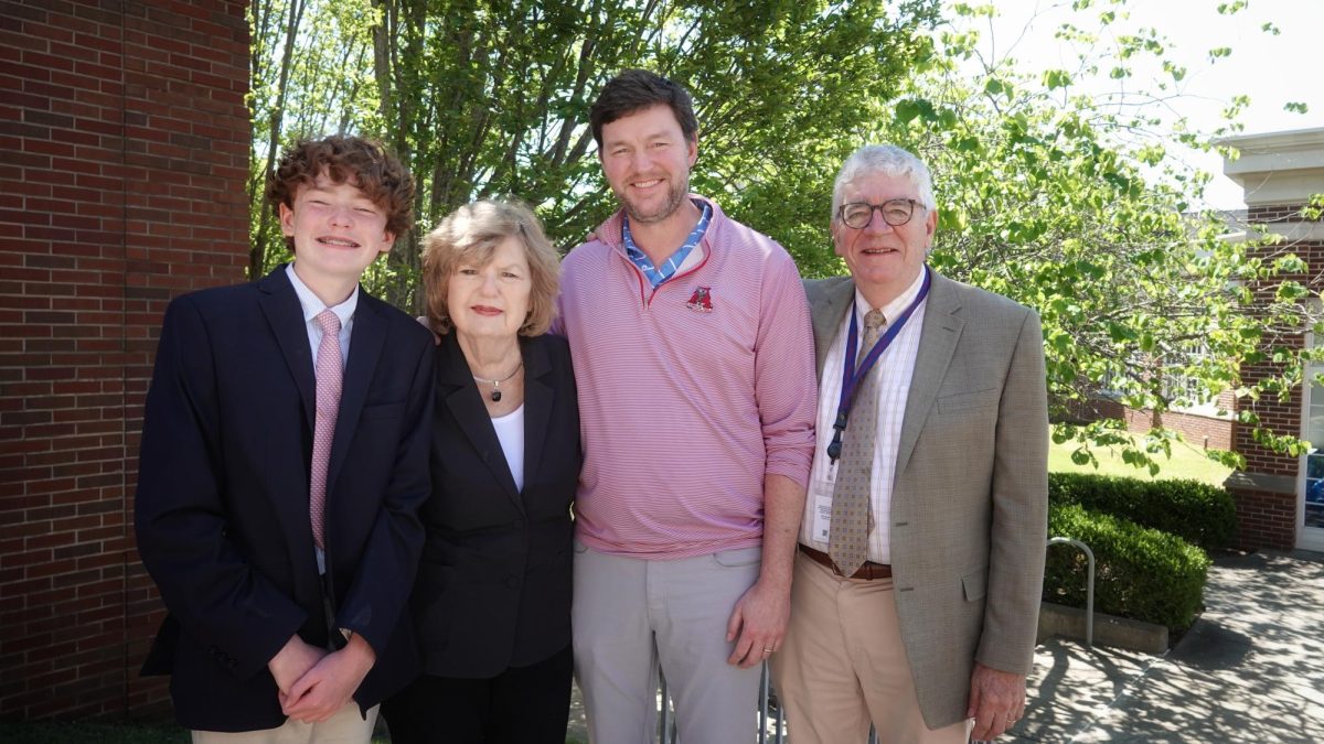 The Askews group up for a photo after the Retirees Chapel.