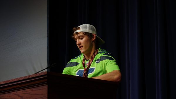 George Willmott (12) reads the “Class of 2026 Ode”