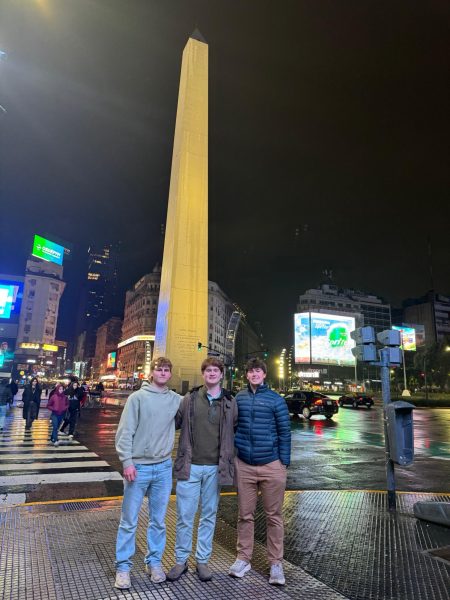 Walker Atkinson (12), Kellett Giles ('26) and Roland Starrett (12) meet up in Buenos Aires and pose for a photo. 