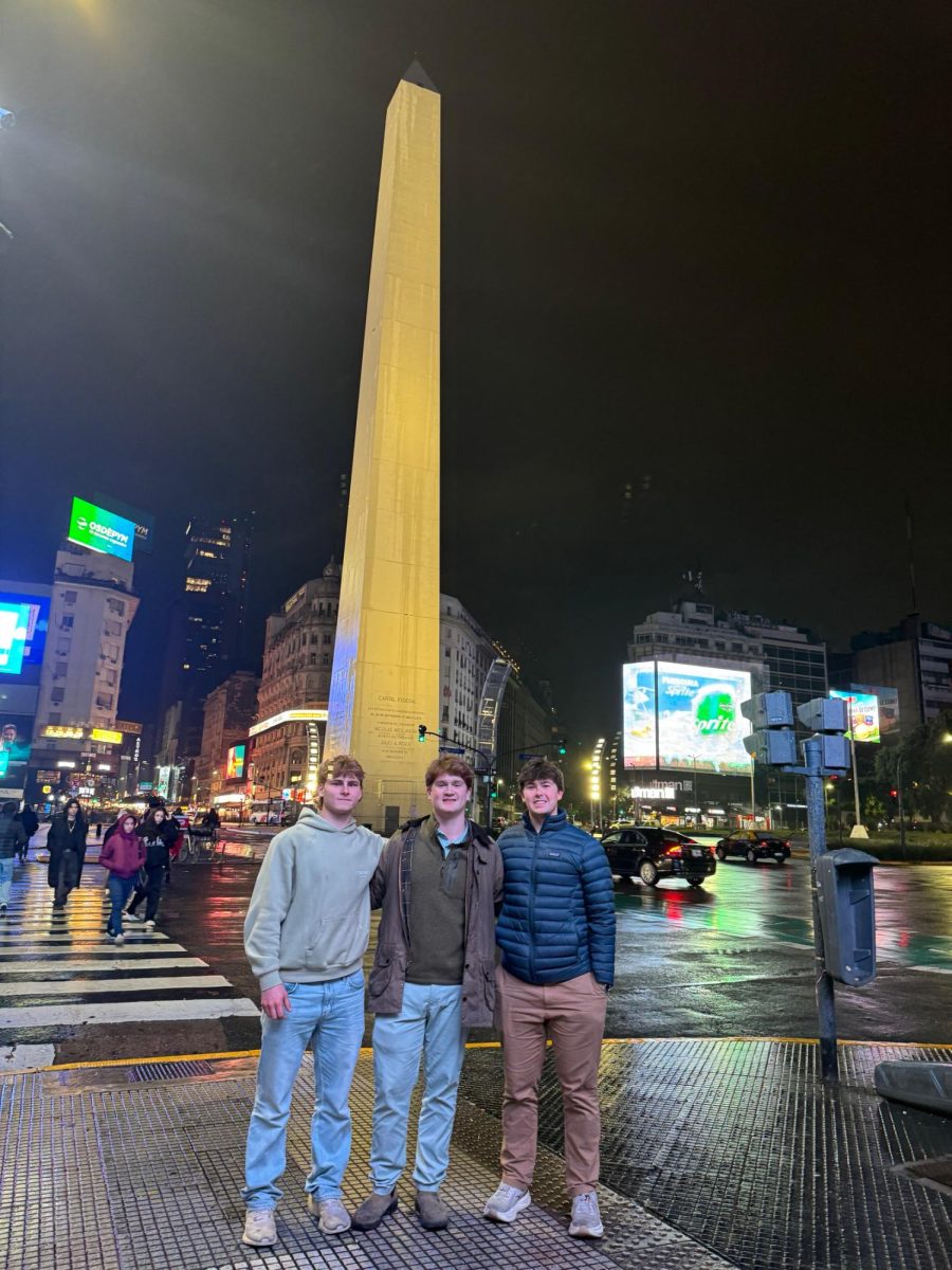 Walker Atkinson (12), Kellett Giles ('26) and Roland Starrett (12) meet up in Buenos Aires and pose for a photo.